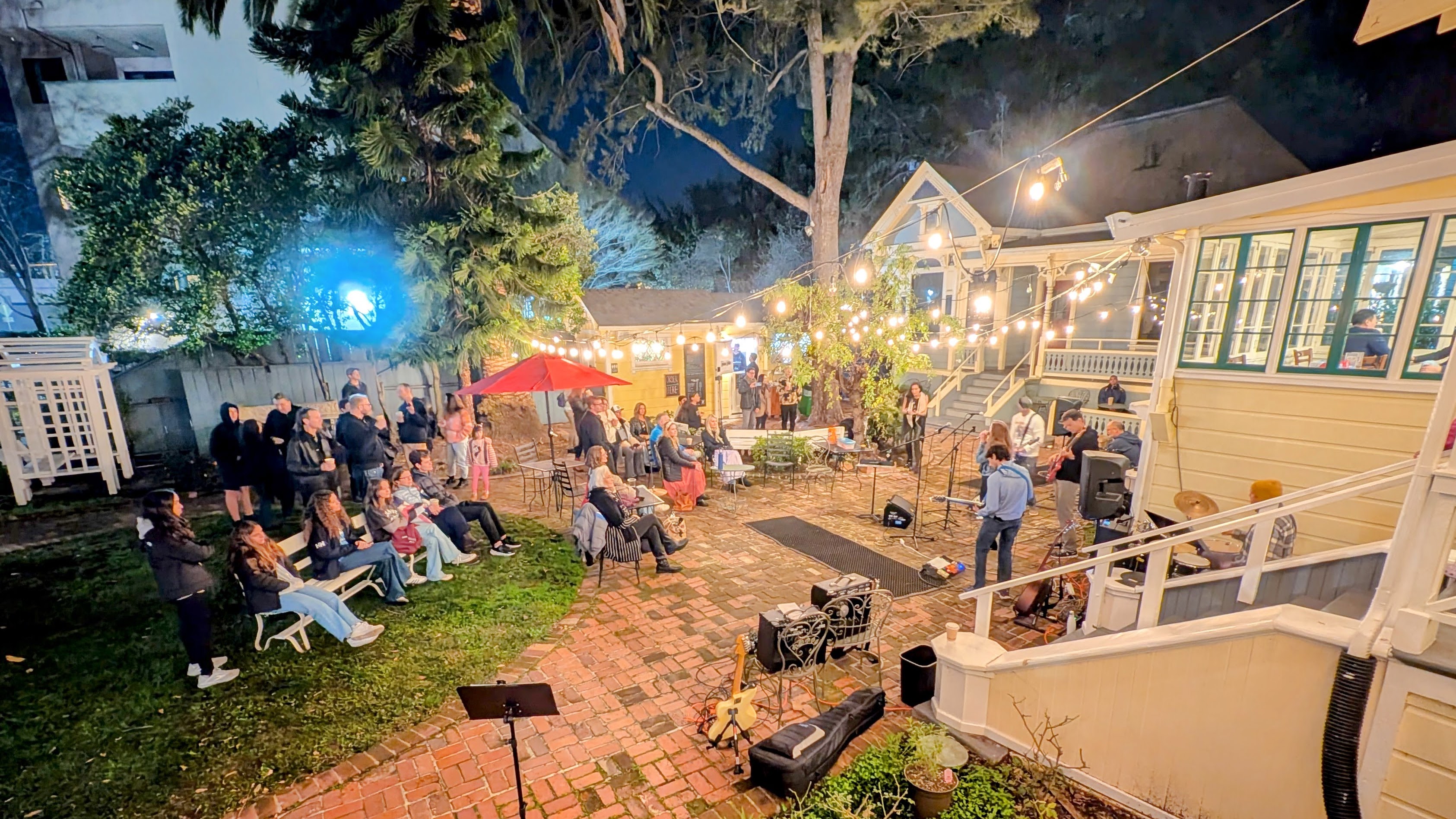 The band After Party playing at night at The Yard